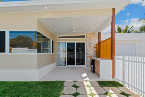 Covered outdoor entertaining area at Poinciana Holiday House in Cooee Bay