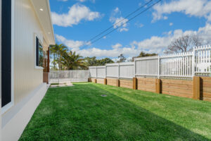 Fully fenced private yard at Poinciana Holiday House in Cooee Bay