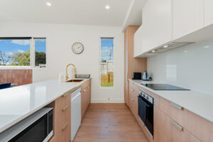 Fully equipped modern kitchen at Poinciana Holiday House in Yeppoon
