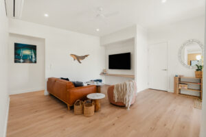 Spacious living room at Poinciana Holiday House in Cooee Bay, Yeppoon